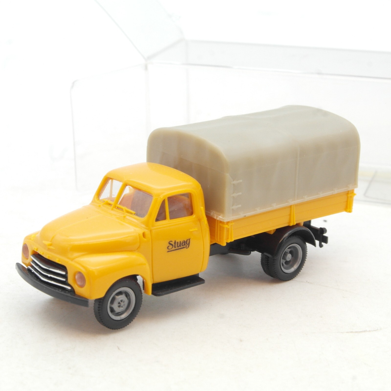 Brekina 1:87 Opel Blitz Pritsche Plane Stuag in EVP RG1403