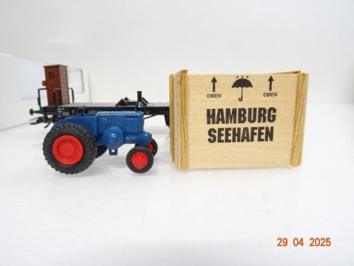 Märklin H0 46843 Flachwagen mit Überseekiste Lanz Bulldog der DB in OVP PR7314 – Bild 4