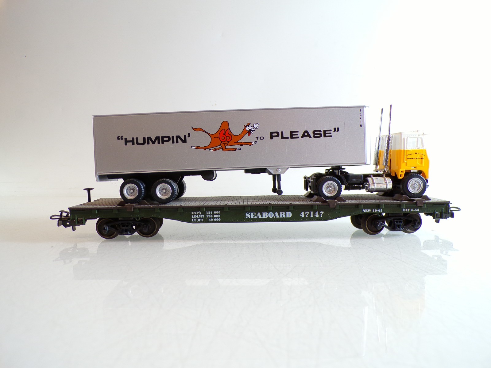Märklin H0 4865 US Flachwagen SEABOARD 47147 mit LKW in OVP BH1459 – Bild 3