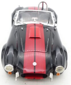Shelby Collectibles Inc. 1:18 Shelby Cobra 427 S/C schwarz/rot in Tüte o. EX8440