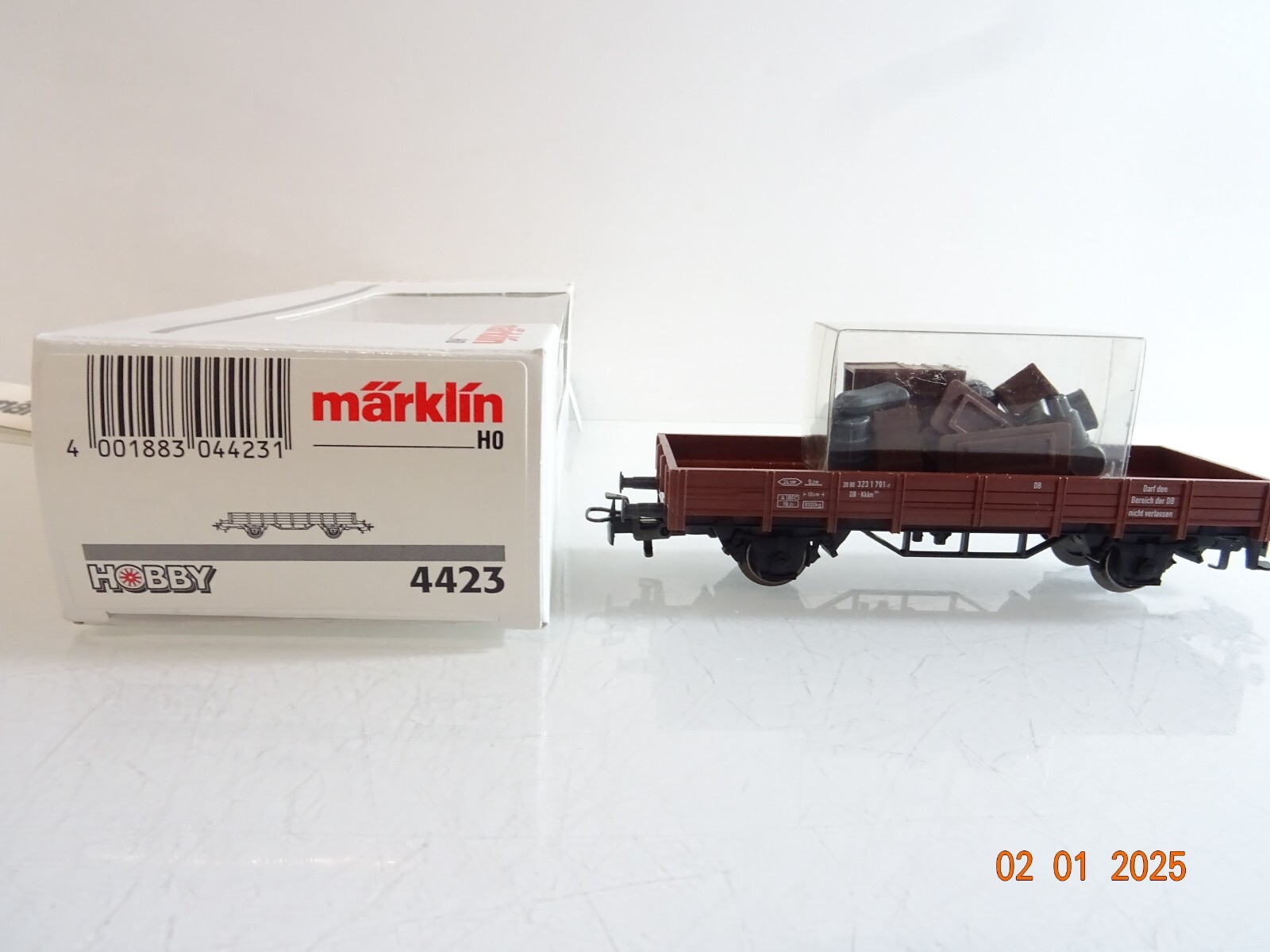 Märklin H0 4423 Güterwagen Niederbordwagen mit Ladung in OVP CK5079