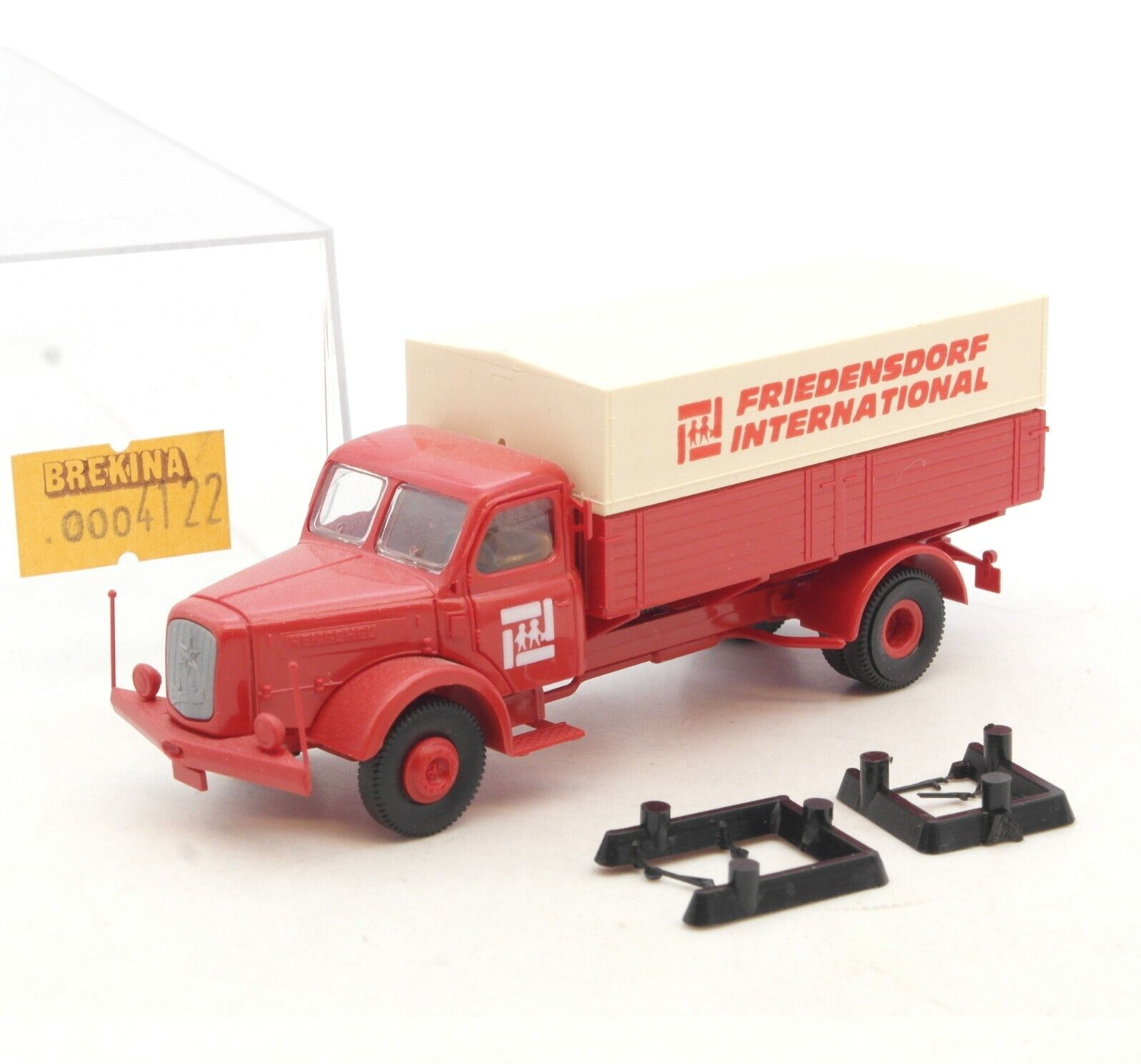 Brekina 1:87 Henschel HS 140 Pritsche Friedensdorf International in EVP RF9818