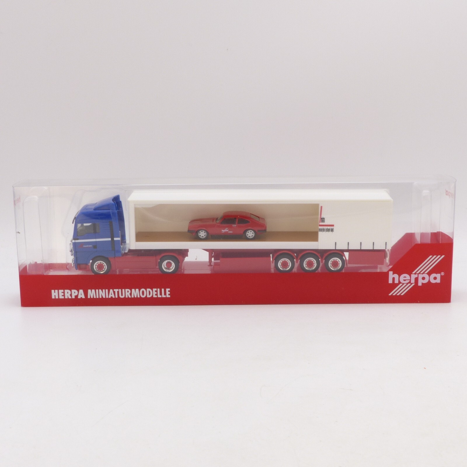 Herpa 1:87 Nr.: 270137 MAN TGA Sattelzug mit Ford Capri riwatrans, in OVP EX964 – Bild 4