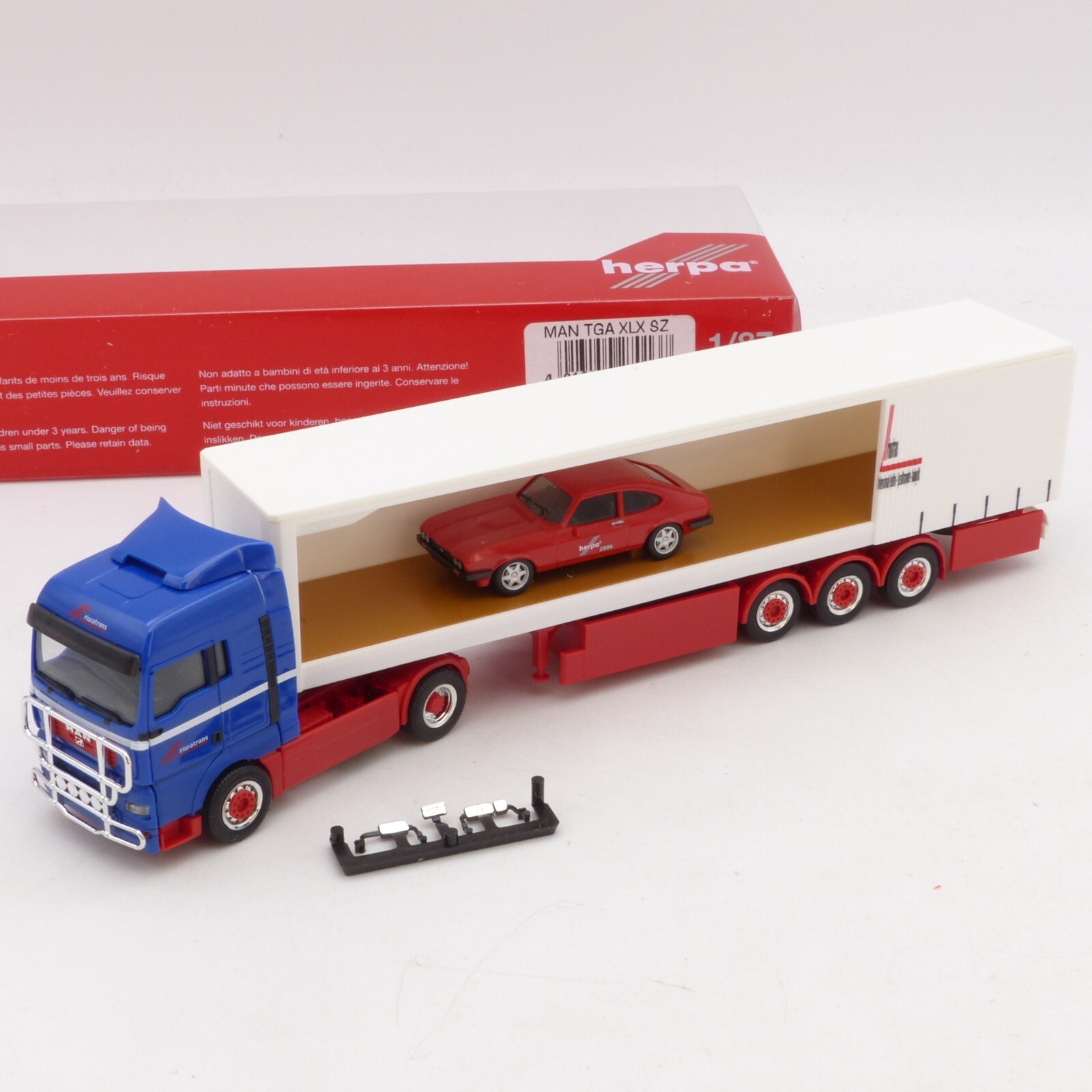 Herpa 1:87 Nr.: 270137 MAN TGA Sattelzug mit Ford Capri riwatrans, in OVP EX964