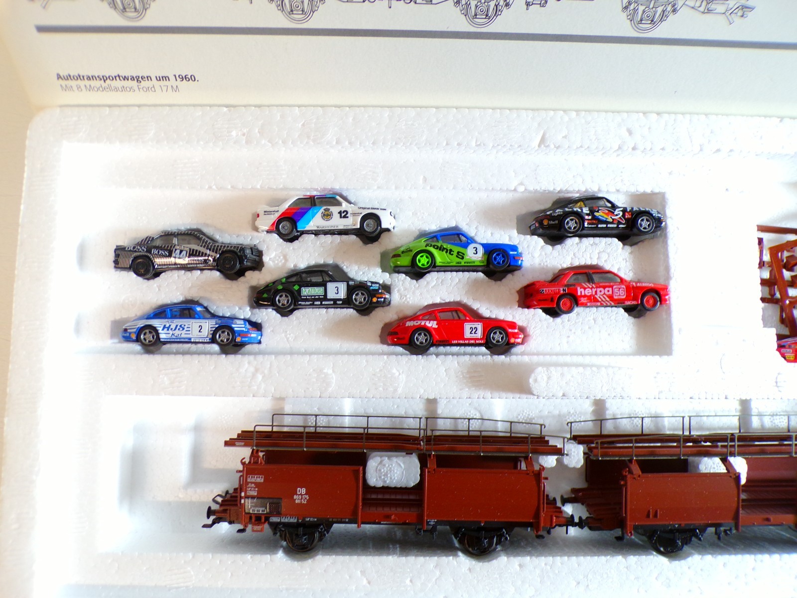 Märklin H0 46122 Autotransportwagen mit 9 Tourenwagen in OVP BH1191 – Bild 4