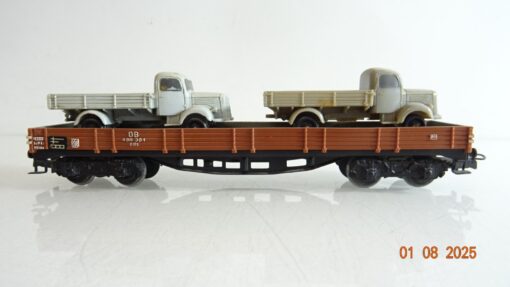 Märklin H0 Niederbordwagen vierachsig mit 2 LKW der DB PR9374 o.