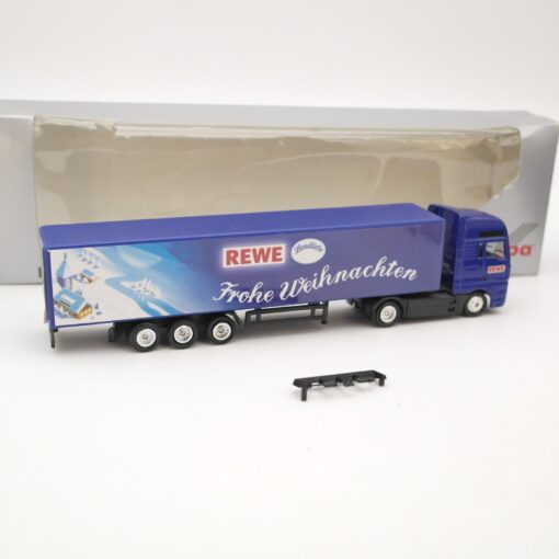 Werbemodell 1:87 MAN Sattelzug Rewe Frohe Weihnacheten in EVP QR6870 – Bild 3