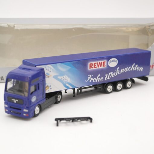 Werbemodell 1:87 MAN Sattelzug Rewe Frohe Weihnacheten in EVP QR6870