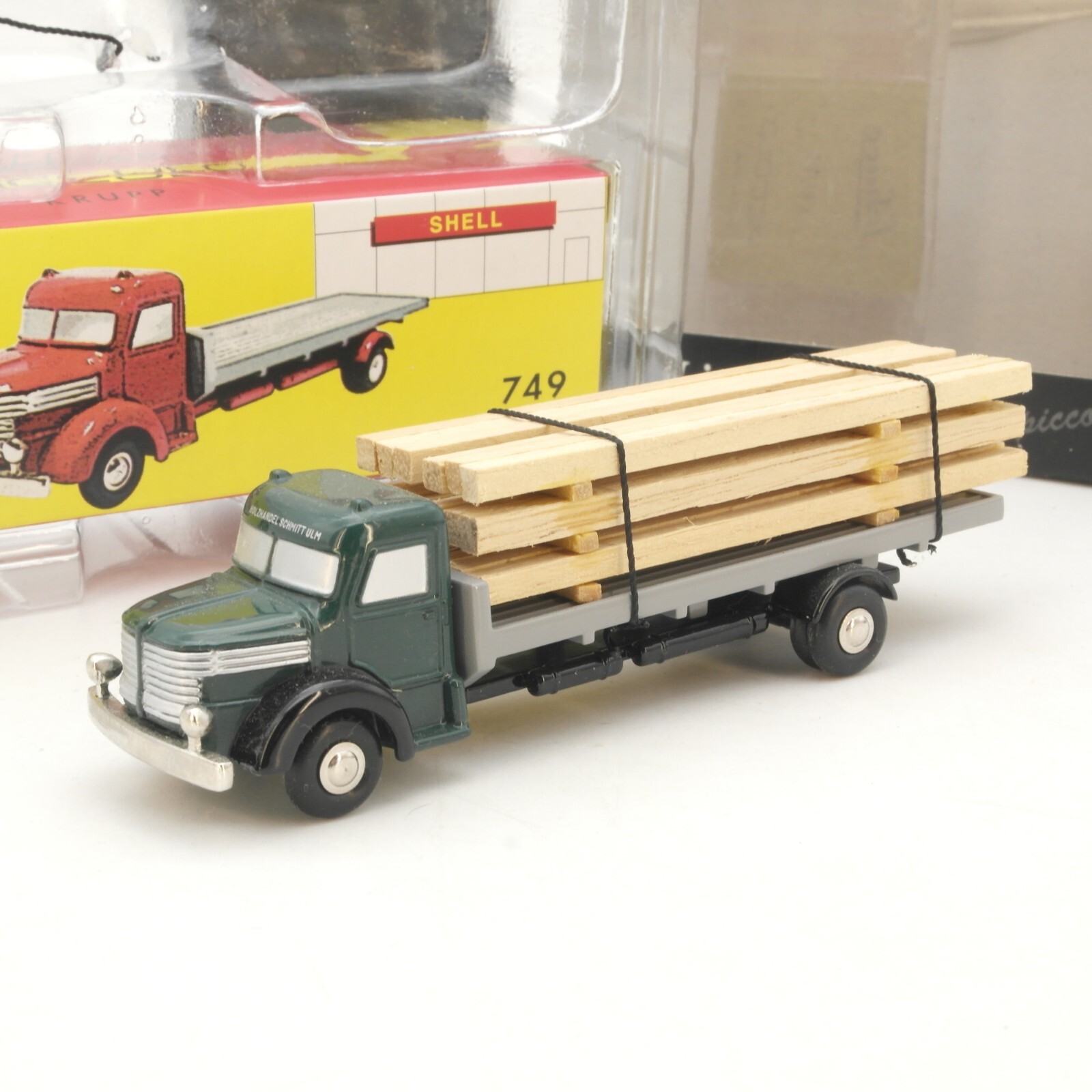Schuco 1:90 Krupp 749 Pritschenwagen Holzhandel in OVP RG7303