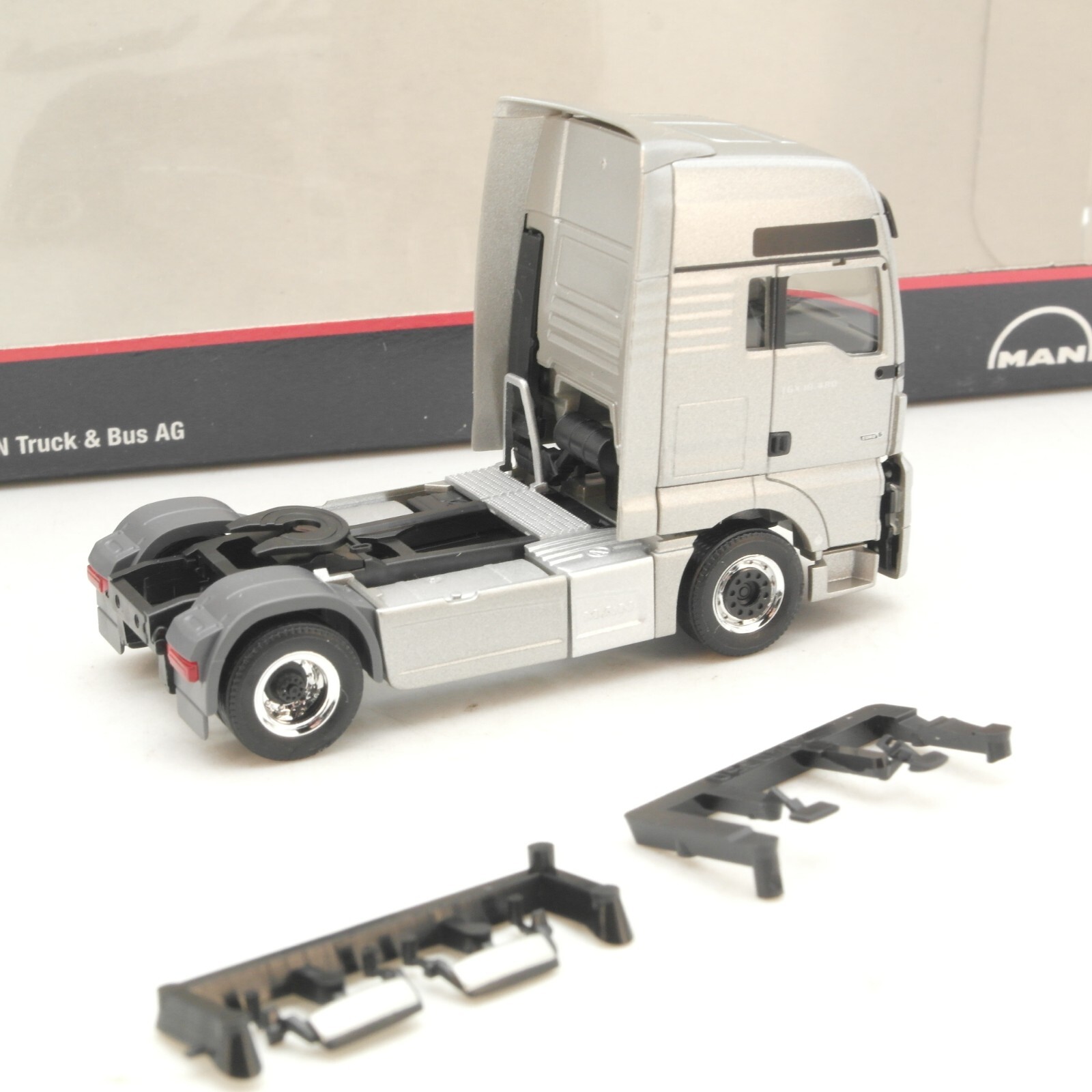 Herpa 1:87 MAN Zugmaschine Truck & Bus AG neuwertig in OVP QR1307 – Bild 3