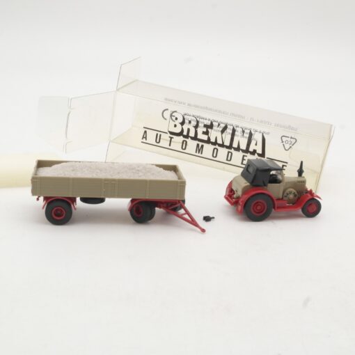 Brekina 1:87 Lanz Bulldog mit Anhänger +Ladung Bau AG in OVP RR3627 – Bild 3