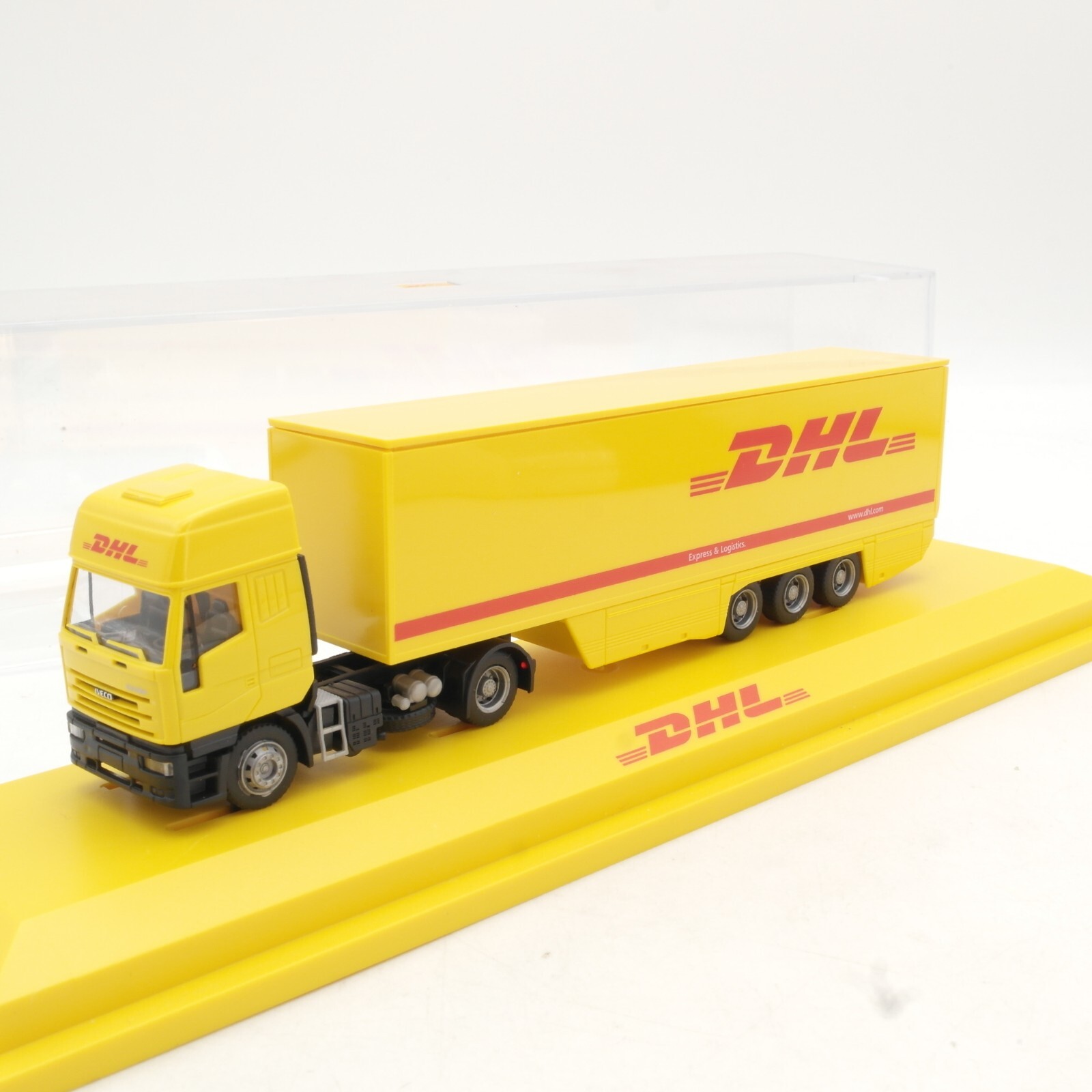 Herpa 1:87 Werbemodell Iveco Sattelzug DHL in PC Box QR973