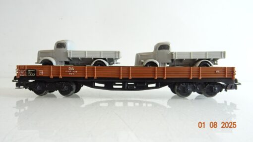 Märklin H0 Niederbordwagen vierachsig mit 2 LKW der DB PR9373 o. – Bild 3