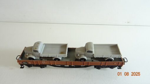 Märklin H0 Niederbordwagen vierachsig mit 2 LKW der DB PR9373 o. – Bild 4