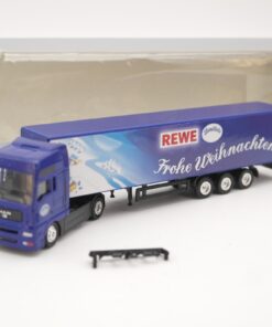 Werbemodell 1:87 MAN Sattelzug Rewe Frohe Weihnacheten in EVP QR6870