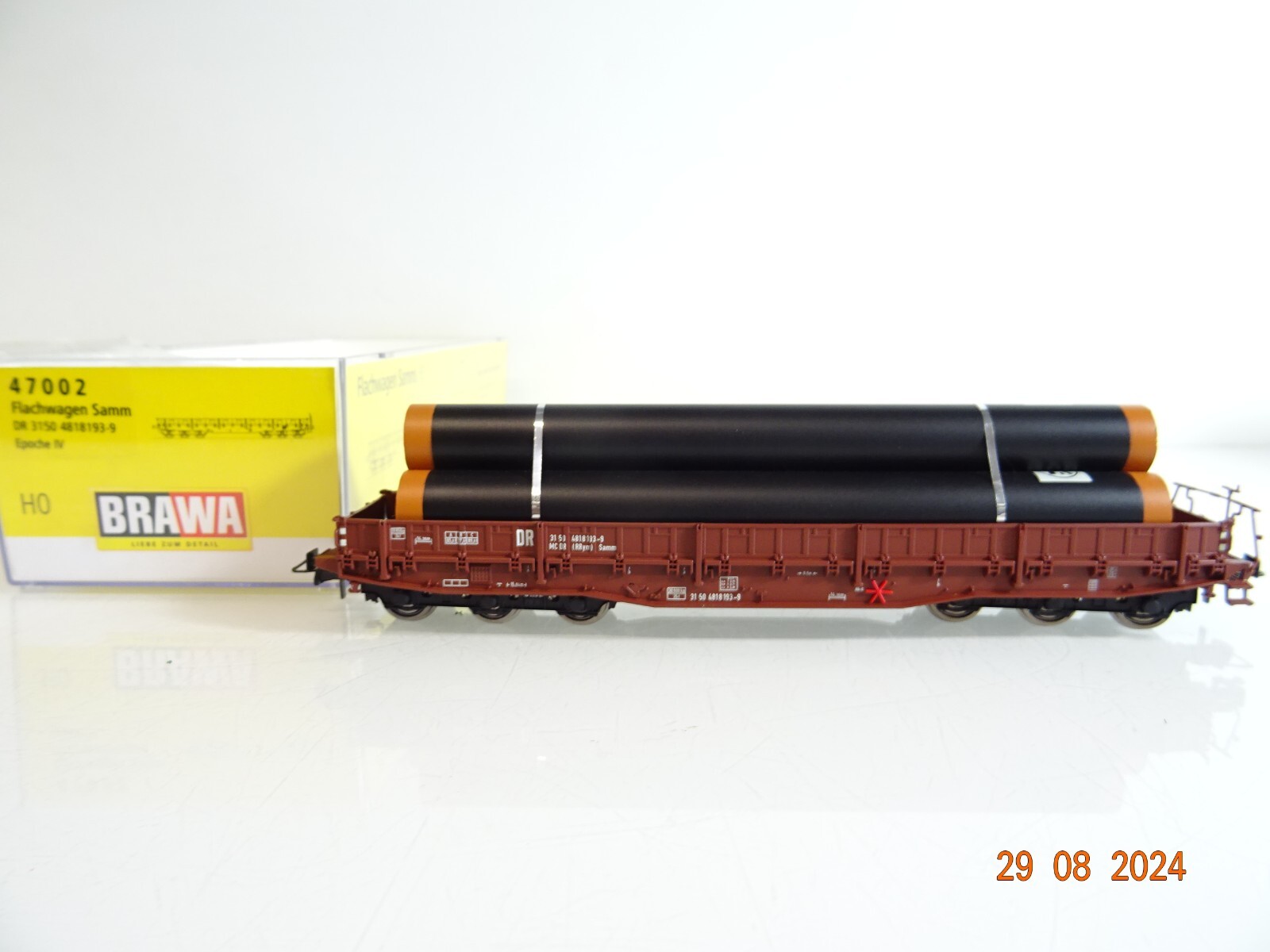 Brawa H0 47002 Flachwagen mit Ladung der DB neuwertig in OVP PR2335