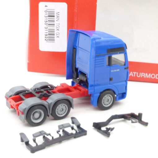 Herpa 1:87 MAN TGX 26.460 Zugmaschine blau in EVP EX6927 – Bild 3