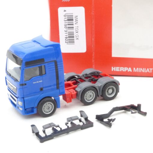 Herpa 1:87 MAN TGX 26.460 Zugmaschine blau in EVP EX6927