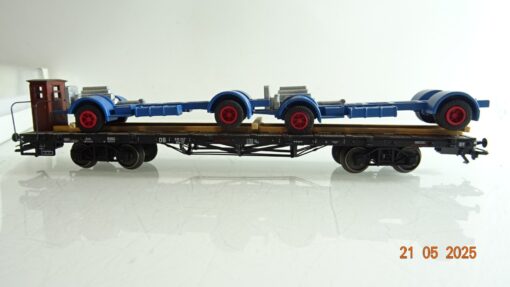 Märklin H0 00691-5 Flachwagen mit 2 LKW Untergestellen der DB in OVP PR7900 – Bild 3