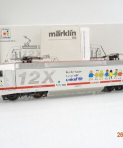 Märklin H0 34382 E-Lok BR 128 12X ADtranz Unicef Delta in OVP JL1084