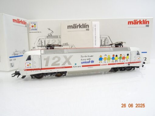 Märklin H0 34382 E-Lok BR 128 12X ADtranz Unicef Delta in OVP JL1084