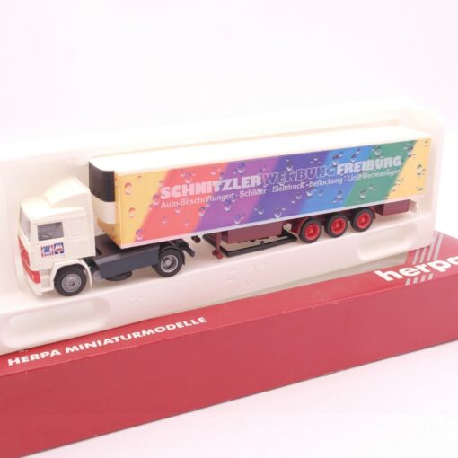 Herpa 1:87 Scania Sattelzug Schnitzler  Werbung Freiburg in EVP RT8319