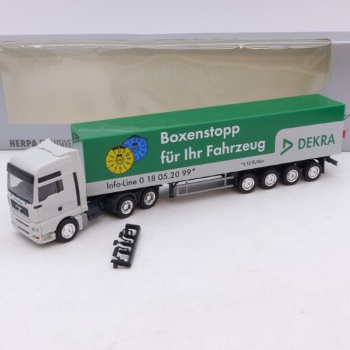 Herpa 1:87 Werbemodell: MAN TGX Sattelzug DEKRA Boxenstopp, in OVP EB7654