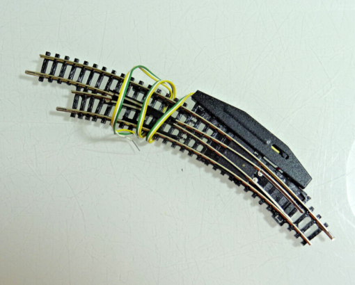 Trix Spur N 14966 Bogenweiche links mit Antrieb siehe Foto CK2085 o.