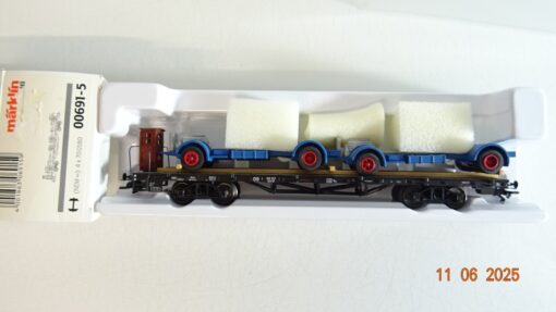 Märklin H0 00691-5 Flachwagen mit zwei LKW Untergestelle der DB in OVP PR8404