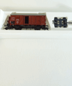 Märklin H0 46821 gedeckter Güterwagen mit Straßenroller der DR in OVP PR2160